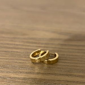 14kt gold mini huggie earrings